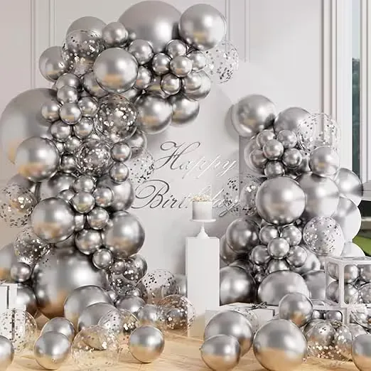 A coordinated balloon installation in soft neutral tones