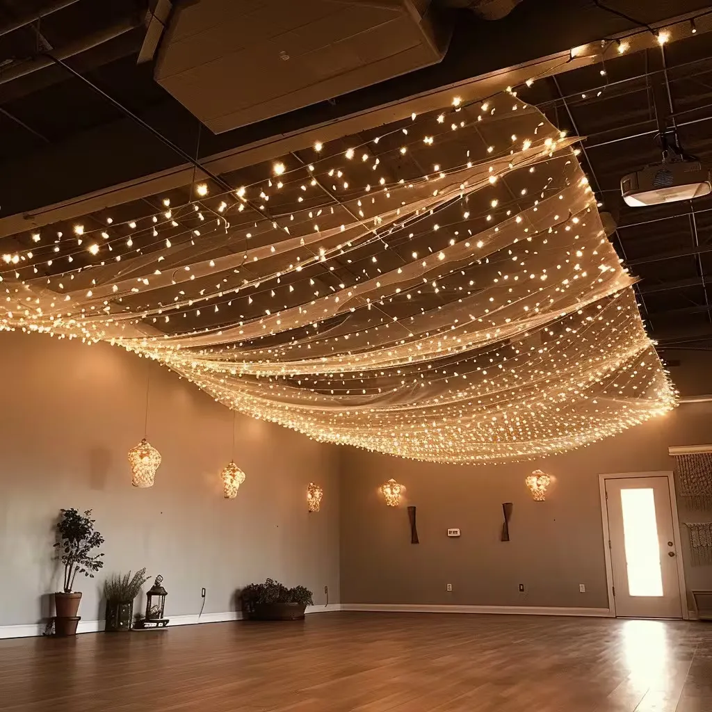 A decorative lighting feature used to frame a seating area
